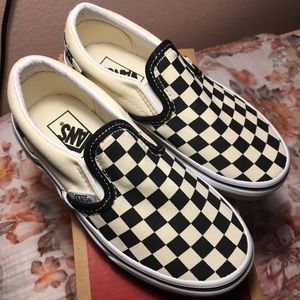 - Black and white checkered Vans